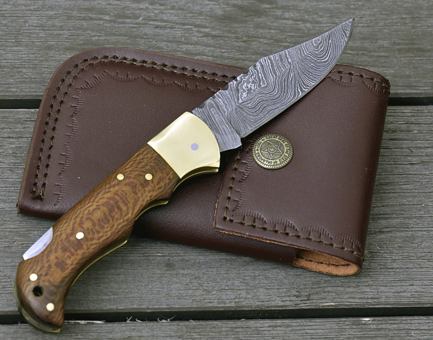 DAMASCUS FOLDING KNIFE, DAMASCUS POCKET KNIFE, CUSTOM DAMASCUS FOLDER, CLIP POINT BLADE, LOCK BACK FOLDING KNIFE, EXOTIC LEOPARD WOOD HANDLE, HAND CARVED SPINE, LANYARD HOLE. - SUSA KNIVES