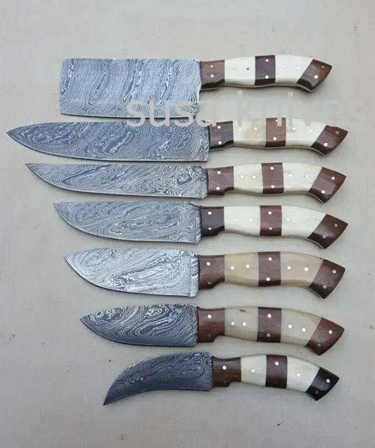 Customized handmade Damascus 7-piece kitchen knife set with twisted steel blades and mixed wood handles