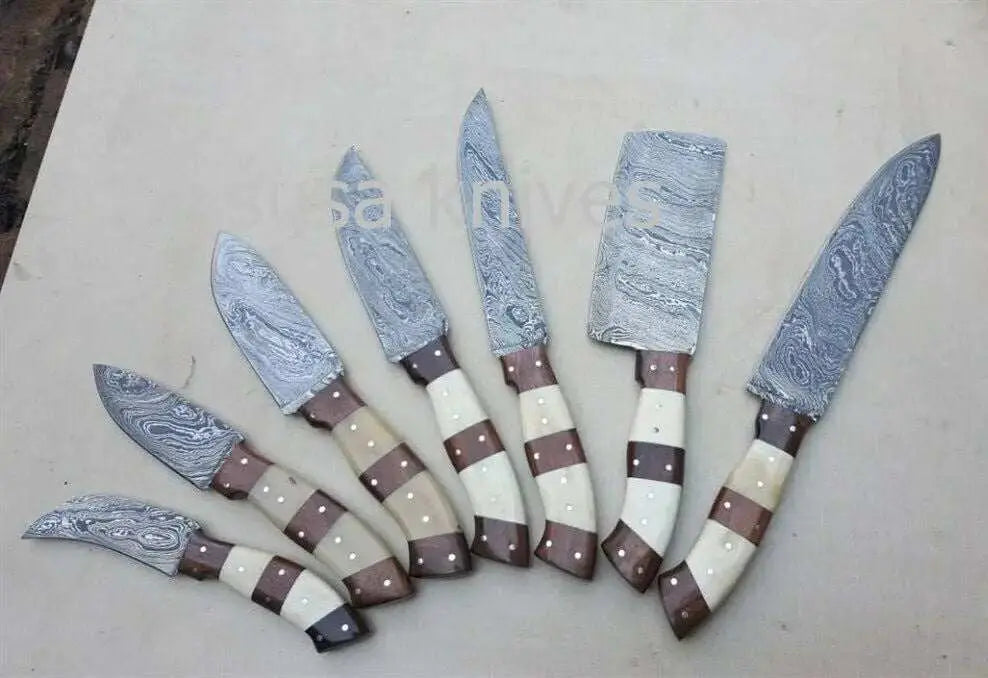 Customized handmade Damascus steel kitchen knife set with twisted blade pattern and wooden handles