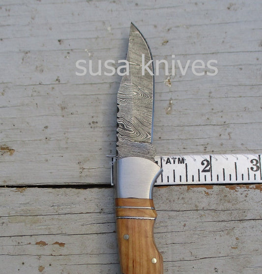 Double Inlay Folding Knife: Olive Wood and Twist Damascus Steel - SUSA KNIVES