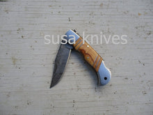 Load image into Gallery viewer, Double Inlay Folding Knife: Olive Wood and Twist Damascus Steel - SUSA KNIVES
