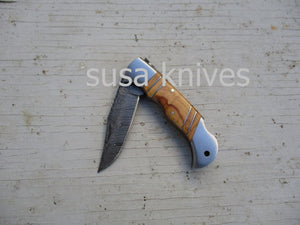 Double Inlay Folding Knife: Olive Wood and Twist Damascus Steel - SUSA KNIVES