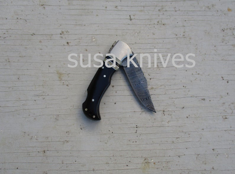 Offset Inlay Folding Knife: Bone & Horn, Twist Damascus Steel - SUSA KNIVES