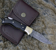 Load image into Gallery viewer, DAMASCUS FOLDING KNIFE, DAMASCUS POCKET KNIFE, CUSTOM DAMASCUS FOLDER, CLIP POINT BLADE, LOCK BACK FOLDING KNIFE, EXOTIC WENGE WOOD SCALES, HAND CARVED SPINE, LANYARD HOLE, HAND STITCHED LEATHER SHEATH - SUSA KNIVES
