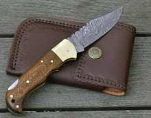 Load image into Gallery viewer, DAMASCUS FOLDING KNIFE, DAMASCUS POCKET KNIFE, CUSTOM DAMASCUS FOLDER, CLIP POINT BLADE, LOCK BACK FOLDING KNIFE, EXOTIC LEOPARD WOOD HANDLE, HAND CARVED SPINE, LANYARD HOLE. - SUSA KNIVES
